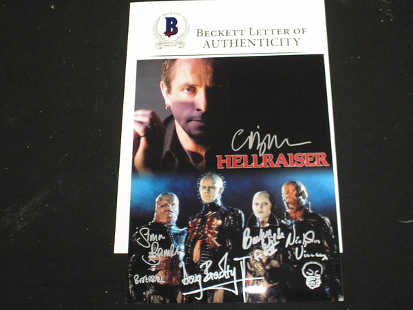 Signed 8x10 Hellraiser photo by Clive Barker, Doug Bradley, and Cenobites with Beckett BAS JSA COA authentication.