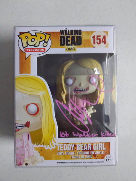 Rare signed Addy Miller vaulted Funko Pop of Teddy Bear Girl from The Walking Dead, pink variant with authentication COA.
